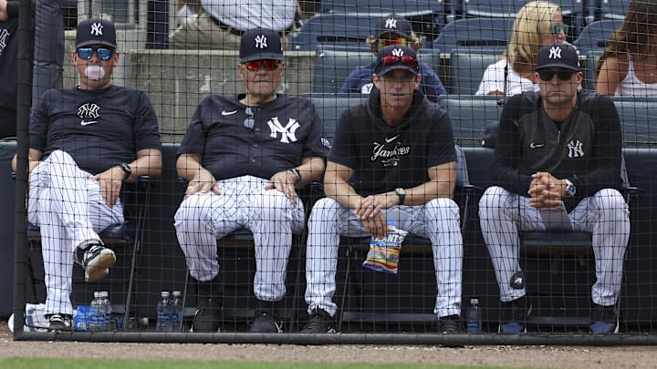 Mar 18, 2024; Tampa, Florida, USA; New York Yankees manger Aaron Boone (17) (left) former manager Joe Torre (left center), bench coach Brad Ausmus (68) (right center) and major league field coordinator Tanner Swanson (76) (right) look on during a spring training game against the Philadelphia Phillies at George M. Steinbrenner Field. Mandatory Credit: Nathan Ray Seebeck-Imagn Images Mar 18, 2024; Tampa, Florida, USA; New York Yankees manger Aaron Boone (17) (left) former manager Joe Torre (left center), bench coach Brad Ausmus (68) (right center) and major league field coordinator Tanner Swanson (76) (right) look on during a spring training game against the Philadelphia Phillies at George M. Steinbrenner Field. Mandatory Credit: Nathan Ray Seebeck-Imagn Images