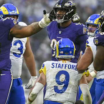 Dec 10, 2023; Baltimore, Maryland, USA; Baltimore Ravens defensive tackle Travis Jones (98) reacts after sacking Los Angeles Rams quarterback Matthew Stafford (9)  during the second  half at M&T Bank Stadium. Mandatory Credit: Tommy Gilligan-Imagn Images