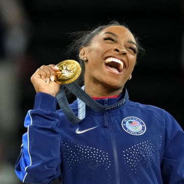 Simone Biles wore Nike Air Max sneakers on the medal stand.