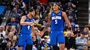 Nov 19, 2023; Indianapolis, Indiana, USA; Orlando Magic forward Paolo Banchero (5)  celebrates his made slam dunk with  guard Jalen Suggs (4) in the first half against the Indiana Pacers at Gainbridge Fieldhouse. Mandatory Credit: Trevor Ruszkowski-Imagn Images