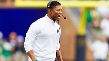 Notre Dame head coach Marcus Freeman celebrates after an interception by cornerback Christian Gray during the first half of a NCAA football game against Purdue at Notre Dame Stadium on Saturday, Sept. 20, 2025, in South Bend.