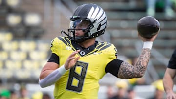 Oregon quarterback Dillon Gabriel throws a pass during warmups as the No. 1 Oregon Ducks host the No. 21 Illinois Fighting Illini Saturday, Oct. 26, 2024 at Autzen Stadium in Eugene, Ore.