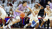 Feb 1, 2025; Ames, Iowa, USA; Iowa State Cyclones guard Keshon Gilbert (10) defends Kansas State Wildcats guard Coleman Hawkins (33) during the first half at James H. Hilton Coliseum. Mandatory Credit: Reese Strickland-Imagn Images