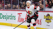 Jan 9, 2025; Ottawa, Ontario, CAN; Ottawa Senators defenseman Nikolas Matinpalo (33) controls the puck in the second period against the Buffalo Sabres at the Canadian Tire Centre. Mandatory Credit: Marc DesRosiers-Imagn Images