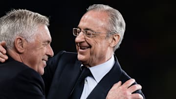 Florentino Perez (R), president of Real Madrid CF, hugs...
