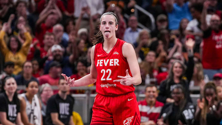 Indiana Fever guard Caitlin Clark (22) reacts to scoring a 3-pointer Friday, Sept. 13, 2024, during a game between the Indiana Fever and the Las Vegas Aces on Friday, Sept. 13, 2024, at Gainbridge Fieldhouse in Indianapolis. The Aces defeated the Fever, 78-74.