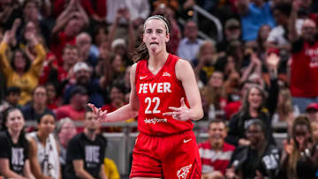 Indiana Fever guard Caitlin Clark (22) reacts to scoring a 3-pointer Friday, Sept. 13, 2024, during a game between the Indiana Fever and the Las Vegas Aces on Friday, Sept. 13, 2024, at Gainbridge Fieldhouse in Indianapolis. The Aces defeated the Fever, 78-74.