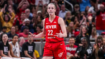 Indiana Fever guard Caitlin Clark (22) reacts to scoring a 3-pointer Friday, Sept. 13, 2024, during a game between the Indiana Fever and the Las Vegas Aces on Friday, Sept. 13, 2024, at Gainbridge Fieldhouse in Indianapolis. The Aces defeated the Fever, 78-74.