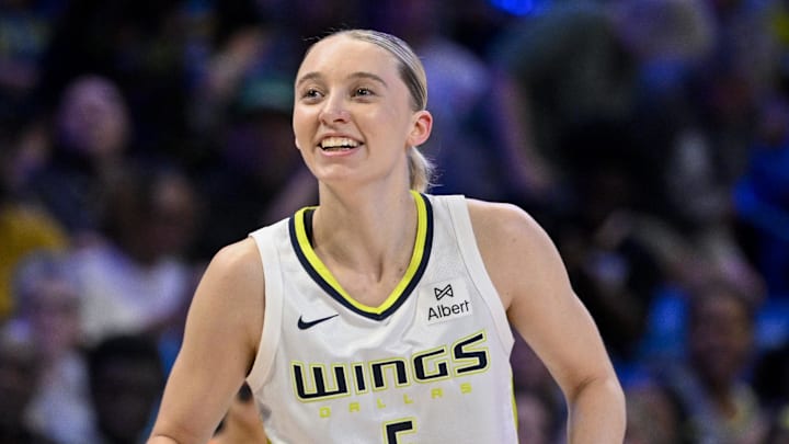 Jul 28, 2025; Arlington, Texas, USA; Dallas Wings guard Paige Bueckers (5) celebrates during the game between the Dallas Wings and the New York Liberty at College Park Center. Mandatory Credit: Jerome Miron-Imagn Images