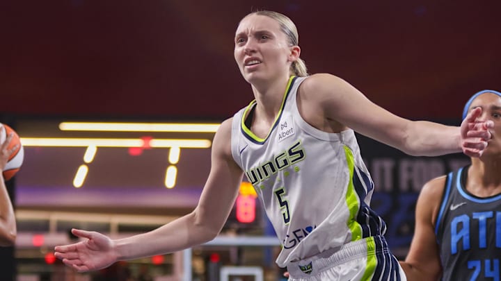 Aug 29, 2025; College Park, Georgia, USA; Dallas Wings guard Paige Bueckers (5) reacts after a play against the Atlanta Dream in the fourth quarter at Gateway Center Arena at College Park. Mandatory Credit: Brett Davis-Imagn Images