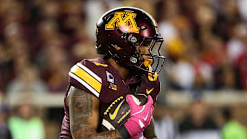 Oct 17, 2025; Minneapolis, Minnesota, USA; Minnesota Golden Gophers running back Darius Taylor (1) runs the ball against the Nebraska Cornhuskers during the second half at Huntington Bank Stadium. Mandatory Credit: Matt Krohn-Imagn Images