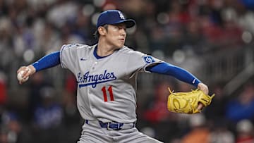 May 3, 2025; Cumberland, Georgia, USA; Los Angeles Dodgers starting pitcher Roki Sasaki (11) pitches against the Atlanta Braves during the first inning at Truist Park. Mandatory Credit: Dale Zanine-Imagn Images