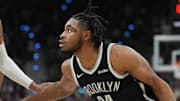 Oct 26, 2025; San Antonio, Texas, USA; Brooklyn Nets guard Cam Thomas (24) dribbles against San Antonio Spurs guard Devin Vassell (24) in the second half at Frost Bank Center. Mandatory Credit: Daniel Dunn-Imagn Images