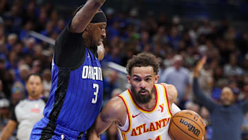 Apr 15, 2025; Orlando, Florida, USA; Atlanta Hawks guard Trae Young (11) controls the ball against the Orlando Magic in the second quarter at Kia Center. Mandatory Credit: Nathan Ray Seebeck-Imagn Images