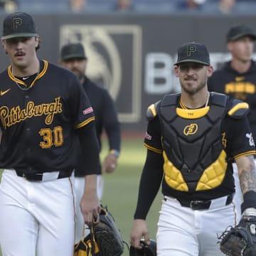 Pittsburgh Pirates starting pitcher Paul Skenes (30) and catcher Yasmani Grandal (6) make their way in from the bullpen to play the Miami Marlins at PNC Park on Sept 9.