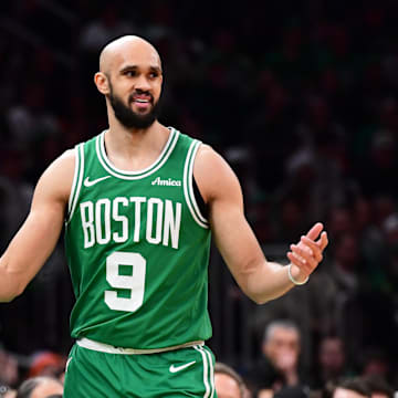 Feb 23, 2025; Boston, Massachusetts, USA;  Boston Celtics guard Derrick White (9) reacts after a turnover during the first half against the New York Knicks at TD Garden. Mandatory Credit: Bob DeChiara-Imagn Images