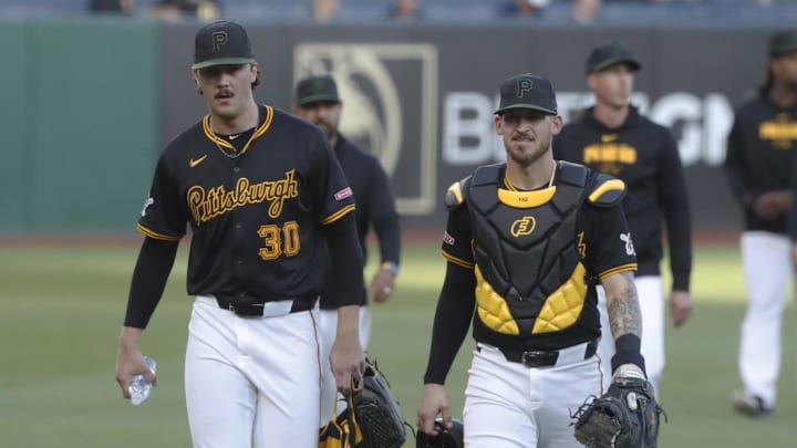 Pittsburgh Pirates starting pitcher Paul Skenes (30) and catcher Yasmani Grandal (6) make their way in from the bullpen to play the Miami Marlins at PNC Park on Sept 9.