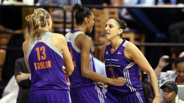 Sep 12, 2014; Chicago, IL, USA; Phoenix Mercury guard Diana Taurasi (3) celebrates with teammates Penny Taylor (13) and DeWanna Bonner (24) after making a basket while being fouled by the Chicago Sky in the fourth quarter in game three of the 2014 WNBA Finals at UIC Pavilion. Mandatory Credit: Jerry Lai-Imagn Images Sep 12, 2014; Chicago, IL, USA; Phoenix Mercury guard Diana Taurasi (3) celebrates with teammates Penny Taylor (13) and DeWanna Bonner (24) after making a basket while being fouled by the Chicago Sky in the fourth quarter in game three of the 2014 WNBA Finals at UIC Pavilion. Mandatory Credit: Jerry Lai-Imagn Images