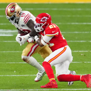 Feb 11, 2024; Paradise, NV; San Francisco 49ers wide receiver Deebo Samuel (19) gets away from Kansas City Chiefs safety Mike Edwards (21) in the first half in Super Bowl LVIII at Allegiant Stadium. 