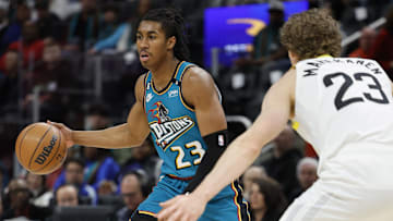 Dec 20, 2022; Detroit, Michigan, USA;  Detroit Pistons guard Jaden Ivey (23) dribbles defended by