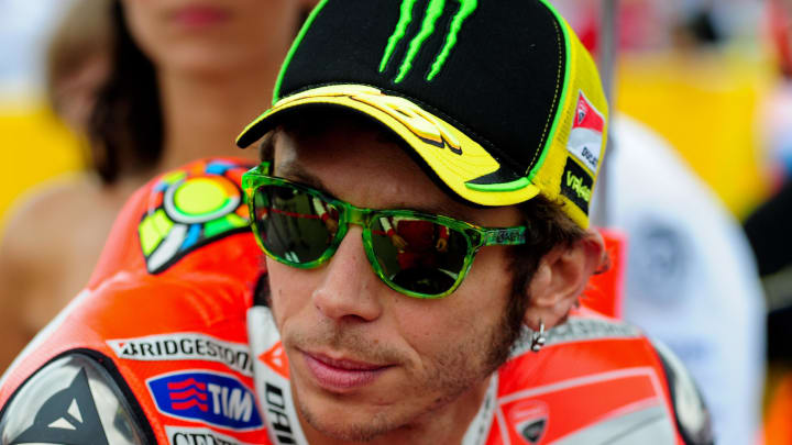 August 26, 2012; Brno, CZECH REPUBLIC; MotoGP rider Valentino Rossi (ITA) looks on prior to the Czech Republic Grand Prix at Automotodrom Brno. Mandatory Credit: Matt Kartozian-USA TODAY Sports