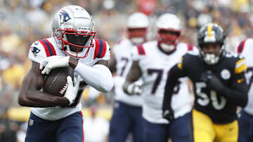 Sep 18, 2022; Pittsburgh, Pennsylvania, USA;  New England Patriots wide receiver Nelson Agholor (15) runs after a catch against the Pittsburgh Steelers lduring the first quarter at Acrisure Stadium. The Patriots won 17-14. Mandatory Credit: Charles LeClaire-Imagn Images