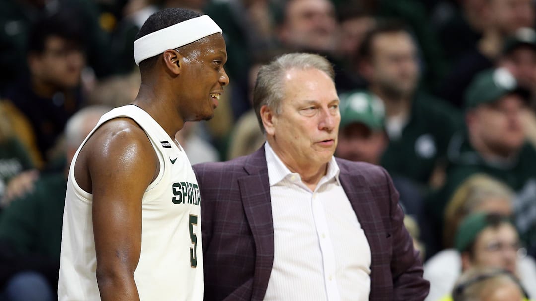 Dec 21, 2019; East Lansing, MI, USA; Michigan State Spartans head coach Tom Izzo  talks to Michigan State Spartans guard Cassius Winston (5) during the second half of a game at the Breslin Center. Mandatory Credit: Mike Carter-Imagn Images