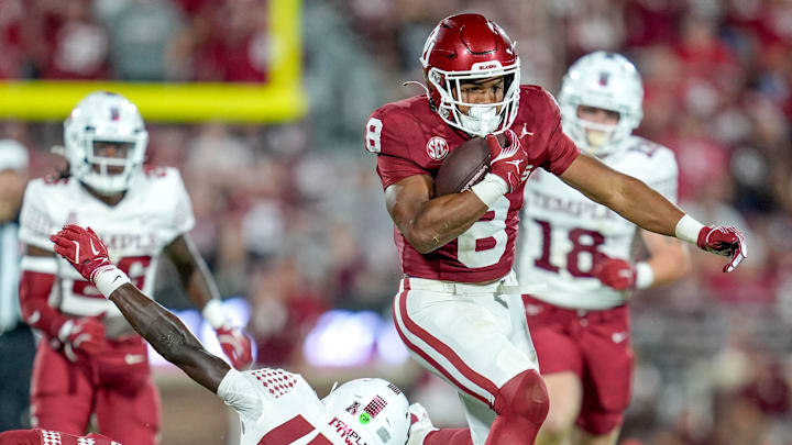 Oklahoma running back Taylor Tatum (8) runs the ball in the second half of an NCAA football game between Oklahoma (OU) and Temple at the Gaylord Family Oklahoma Memorial Stadium in Norman, Okla., on Friday, Aug. 30, 2024.