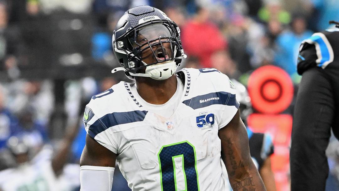 Dec 28, 2025; Charlotte, North Carolina, USA; Seattle Seahawks defensive end DeMarcus Lawrence (0) reacts against the Carolina Panthers during the fourth quarter at Bank of America Stadium. Mandatory Credit: Bob Donnan-Imagn Images