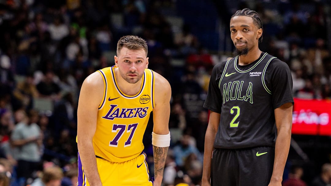 Jan 6, 2026; New Orleans, Louisiana, USA;  Los Angeles Lakers forward/guard Luka Doncic (77) looks on against New Orleans Pelicans forward Herbert Jones (2) during the second half at Smoothie King Center. Mandatory Credit: Stephen Lew-Imagn Images