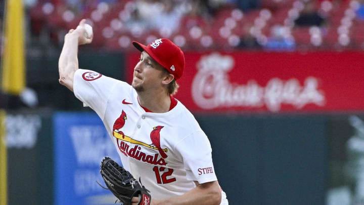 St. Louis Cardinals starting pitcher Erick Fedde (12) pitches against the Milwaukee Brewers during the first inning at Busch Stadium on Aug 20.