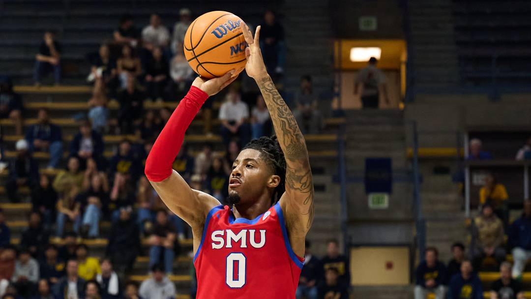 Feb 25, 2026; Berkeley, California, USA; SMU Mustangs guard B.J. Edwards (0) shoots a three point shot against the California Golden Bears during the first half at Haas Pavilion.