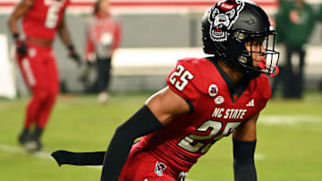 Nov 4, 2023; Raleigh, North Carolina, USA; North Carolina State Wolfpack defensive back Brandon Cisse (25) warms up prior to a game against the Miami Hurricanes at Carter-Finley Stadium. Mandatory Credit: Rob Kinnan-Imagn Images