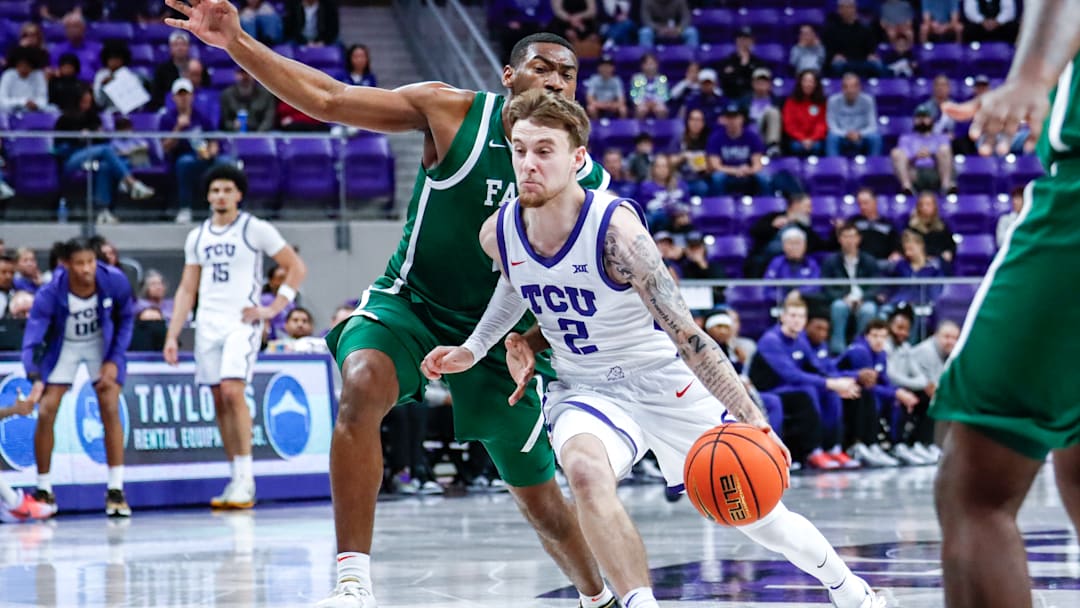 TCU guard Brock Harding drives to the basket against Florida A&M