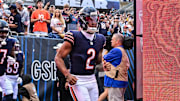 Aug 17, 2024; Chicago, Illinois, USA; Chicago Bears wide receiver DJ Moore (2) enters the field before the game against the Cincinnati Bengals at Soldier Field. Mandatory Credit: Daniel Bartel-Imagn Images