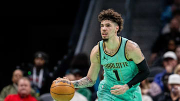 Jan 25, 2025; Charlotte, North Carolina, USA; Charlotte Hornets guard LaMelo Ball (1) brings the ball up court against the New Orleans Pelicans during the first quarter at Spectrum Center. Mandatory Credit: Scott Kinser-Imagn Images