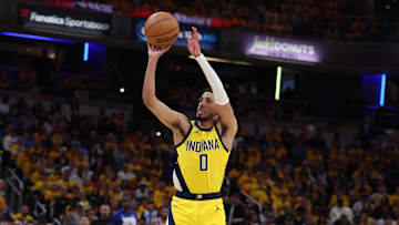 May 27, 2025; Indianapolis, Indiana, USA; Indiana Pacers guard Tyrese Haliburton (0) shoots a three point basket during the second quarter against the New York Knicks of game four of the eastern conference finals for the 2025 NBA Playoffs at Gainbridge Fieldhouse. Mandatory Credit: Trevor Ruszkowski-Imagn Images