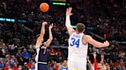 Nov 14, 2025; Inglewood, California, USA;  Arizona Wildcats guard Anthony Dell'Orso (3) shoots the ball over UCLA Bruins forward Tyler Bilodeau (34) during the first half of the Hall of Fame Series game at Intuit Dome. Mandatory Credit: Kiyoshi Mio-Imagn Images