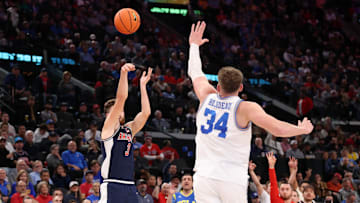 Nov 14, 2025; Inglewood, California, USA;  Arizona Wildcats guard Anthony Dell'Orso (3) shoots the ball over UCLA Bruins forward Tyler Bilodeau (34) during the first half of the Hall of Fame Series game at Intuit Dome. Mandatory Credit: Kiyoshi Mio-Imagn Images