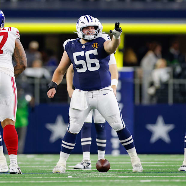 Dallas Cowboys center Cooper Beebe signals at the line against the New York Giants at AT&T Stadium 