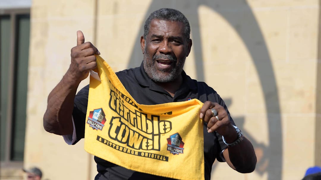 Aug 4, 2018; Canton, OH, USA; Joe Greene holds a Pittsburgh Steelers terrible towel during the Pro Football Hall of Fame Grand Parade on Cleveland Avenue. Mandatory Credit: Kirby Lee-Imagn Images Aug 4, 2018; Canton, OH, USA; Joe Greene holds a Pittsburgh Steelers terrible towel during the Pro Football Hall of Fame Grand Parade on Cleveland Avenue. Mandatory Credit: Kirby Lee-Imagn Images