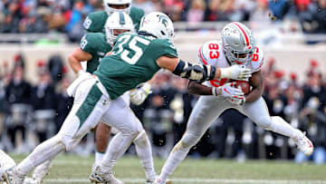 Nov 10, 2018; East Lansing, MI, USA; Ohio State Buckeyes wide receiver Terry McLaurin (83) makes a catch in front of Michigan State Spartans linebacker Joe Bachie (35) during the second half of a game at Spartan Stadium. Mandatory Credit: Mike Carter-Imagn Images