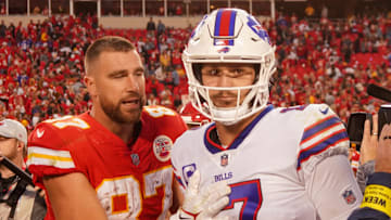 Kansas City Chiefs tight end Travis Kelce (87) talks with Buffalo Bills quarterback Josh Allen (17)