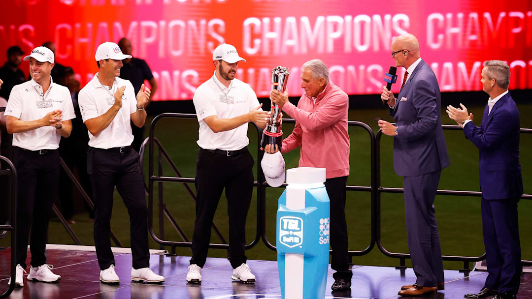 Arthur Blank presents the SoFi Cup to Patrick Cantlay after Atlanta Drive GC won the inaugural TGL championship series