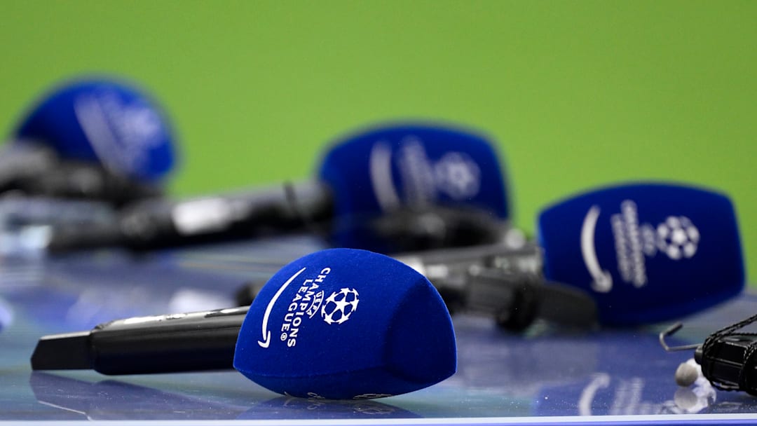 Some microphones with the Champions league logo are seen on... Some microphones with the Champions league logo are seen on...
