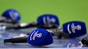 Some microphones with the Champions league logo are seen on...