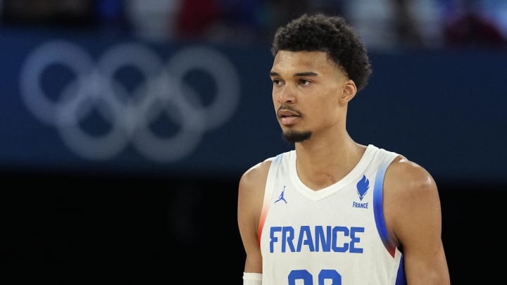 Aug 8, 2024; Paris, France; France power forward Victor Wembanyama (32) looks on during the second half against Germany in a men's basketball semifinal game during the Paris 2024 Olympic Summer Games at Accor Arena. Mandatory Credit: Kyle Terada-USA TODAY Sports