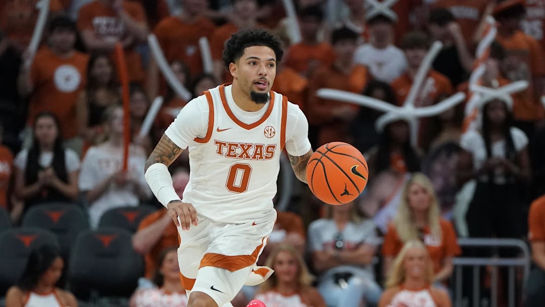 Texas Longhorns guard Jordan Pope dribbles during the first half against the Lafayette Leopards at Moody Center. Mandatory Credit: Dustin Safranek-Imagn Images Texas Longhorns guard Jordan Pope dribbles during the first half against the Lafayette Leopards at Moody Center. Mandatory Credit: Dustin Safranek-Imagn Images