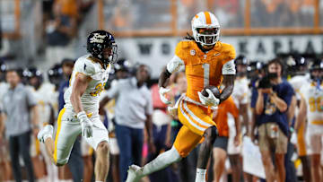 Sep 14, 2024; Knoxville, Tennessee, USA; Tennessee Volunteers wide receiver Dont'e Thornton Jr. (1) catches a pass against Kent State Golden Flashes safety Nick Cuva (36) at Neyland Stadium. Mandatory Credit: Randy Sartin-Imagn Images