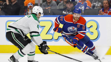 May 29, 2024; Edmonton, Alberta, CAN; Edmonton Oilers forward Connor McDavid (97) makes a move on Dallas Stars defensemen Miro Heiskanen (4) during the third period in game four of the Western Conference Final of the 2024 Stanley Cup Playoffs at Rogers Place. Mandatory Credit: Perry Nelson-USA TODAY Sports